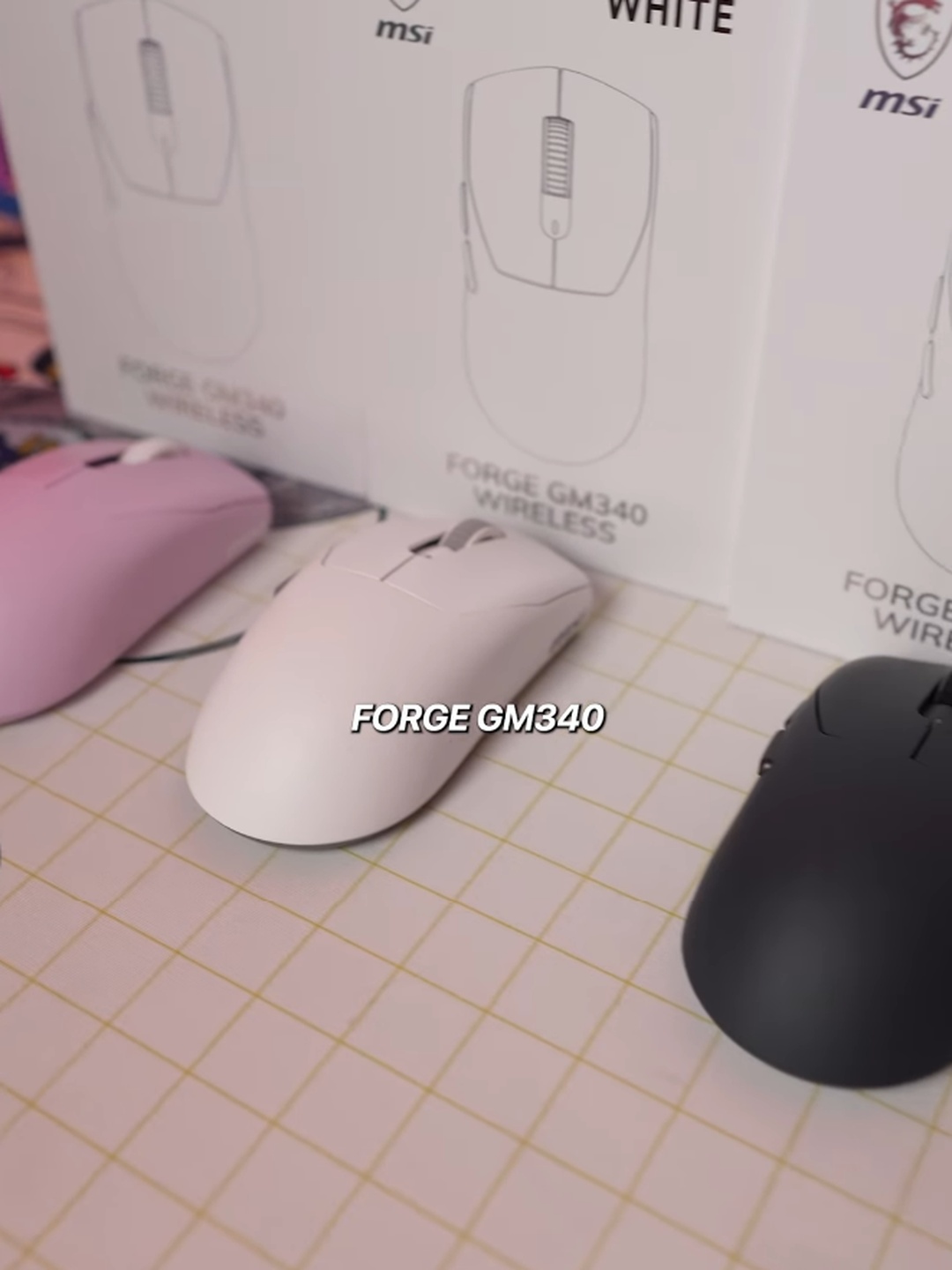 Pink and purple desk setup with MSI peripherals
